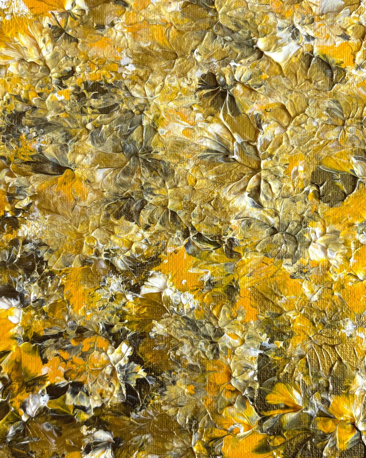 An abstract textured painting featuring a dense composition of metallic gold, yellow, olive green, and silver paint strokes with a reflective, shimmering finish.